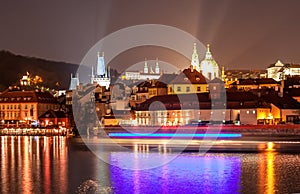 Towers and buildings of Prague at night