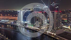 Towers at the Business Bay aerial night timelapse in Dubai, United Arab Emirates