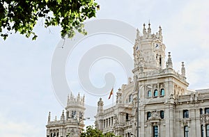 Towers of city hall in Madrid, Spain. Historical building known as Palacio de Cibeles photo