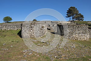 Towers of the entrance to the wall of Castro de San CibrÃ¡n de LÃ¡s.