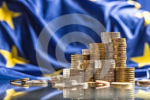 Towers with euro coins and flag of European Union in the background