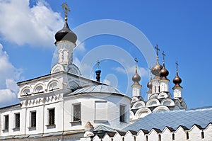 Towers and golden cupolas of church in Murom