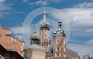 Towers of an Gothic church St. Mary's Basilica on the Old Centre of Krakow, Rynek Glowny. Poland old architecture