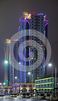 Towers of Grozny City in the evening in a fog