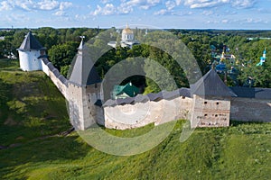 Towers of the Holy Dormition Pskov-Caves Monastery on a sunny July day. Pechory, Russia