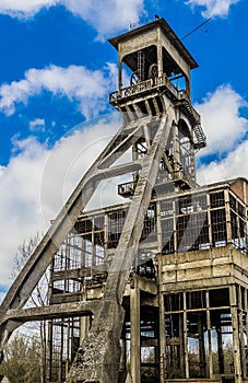 Towers of a mine in remodeling on a sunny day