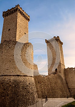 Towers and rampart of Pacentro castle at sunset