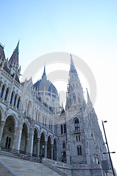 Towers and roof of old building of Hungarian Parliament in Budapest
