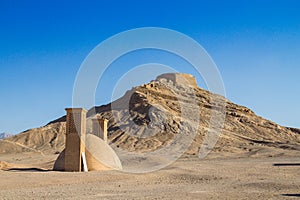 Towers of Silence in Yazd, Iran, in the middle of the desert. Also known as Dakhma, These towers were used by Zoroastrians