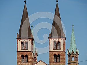 Towers of St. Kilian cathedral under the blue clear sky in Wuerzburg, Germany