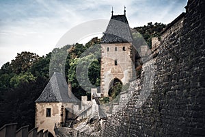 Towers and walls of famous medieval Karlstejn castle. Karlstein