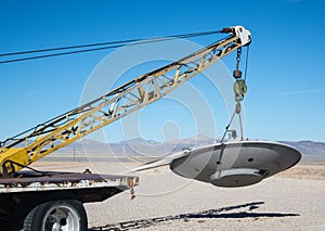 Towing a flying saucer