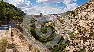 Town of Alcala del Jucar, Castilia la Mancha, Spain, the castle towering above the white village