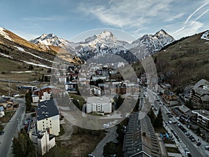 Town in the alps mountains during sunset. Aerial drone photo. French alps in winter, Rhone Alpes in France Europe . Les deux