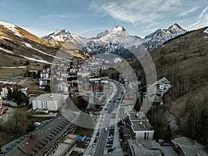 Town in the alps mountains during sunset. Aerial drone photo. French alps in winter, Rhone Alpes in France Europe . Les deux