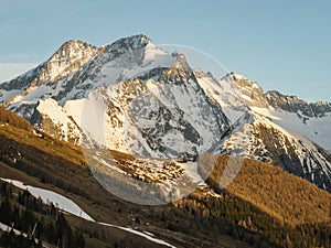 Town in the alps mountains during sunset. Aerial drone photo. French alps in winter, Rhone Alpes in France Europe . Les deux