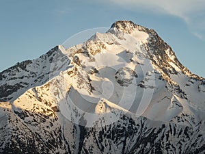 Town in the alps mountains during sunset. Aerial drone photo. French alps in winter, Rhone Alpes in France Europe . Les deux