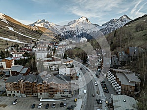 Town in the alps mountains during sunset. Aerial drone photo. French alps in winter, Rhone Alpes in France Europe . Les deux