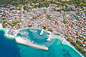 Town of Baska Voda beach and waterfront aerial view