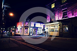 Town center of Barnsley with illuminated buildings, UK