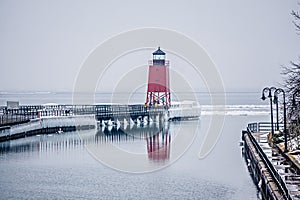 Town of Charlevoix and South Pier Lighthouse on lake michigan