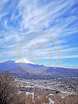 Town, clouds, Fuji mountain, residential buildings in Japan countryside