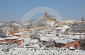 Town covered with snow. Corneliano D'Alba, Italy.