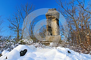 in the town of Goerlitz, the Landeskrone mountain in winter with Bismarck Tower