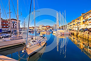 Town of Grado colorful waterfront and harbor view photo