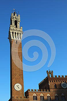 Town Hall called PALAZZO PUBBLICO and Tower in Siena In itay