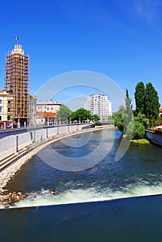 The Town Hall Palace and the river Crisul Repede. The photo is taken from Saint Ladislau Bridge.