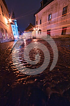 Town hall square in Banska Stiavnica town during winter evening