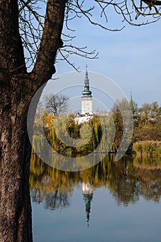 Town Hall tower in Litovel in the mirror of the pond photo