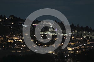 Town On A Hill Slope At Night