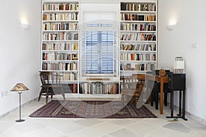 Town House With Books Arranged In Library
