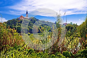 Town of Ilok church on the hill above lake