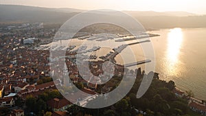 Town Izola in Slovenia at sunset, a picturesque Mediterranean settlement, aerial