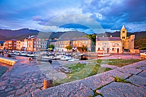 Town of Karlobag waterfront and Velebit ,ountain dusk view