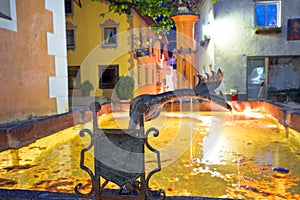 Town of Kastelruth or Castelrotto fountain and street evening view