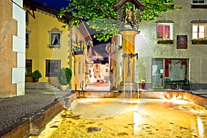 Town of Kastelruth fountain and street evening view