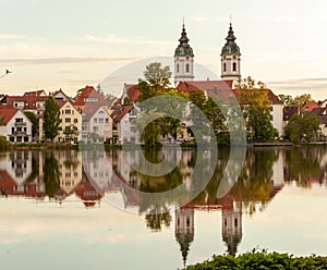 Town lake and towers of Collegiate Church of St. Peter in Bad Waldsee photo