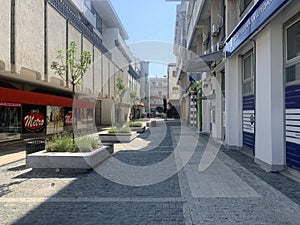 The town of Leskovac in southern Serbia - A view of part of the city passage with cafes and shops in the summer time.