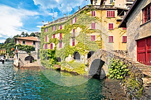 Town of Nesso historic stone bridge and waterfront on Como Lake