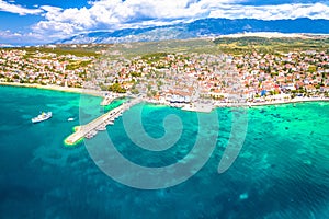 Town of Novalja beach and waterfront on Pag island aerial view