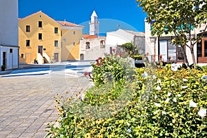 Town of Novi Vinodolski church and old stone square view