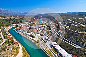 Town of Obrovac and Zrmanja river canyon panoramic aerial view