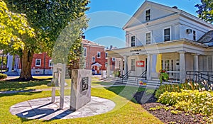 Town offices building and U.S.S. Bennington plaque