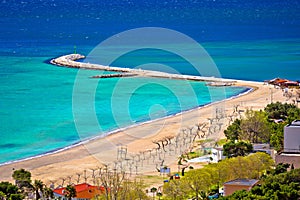 Town of Omis beach and sanbar aerial view