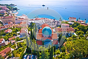 Town of Opatija cathedral and waterfront aerial view