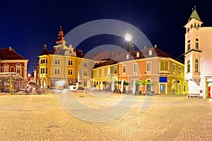 Town of Ptuj historic main square panoramic evening view